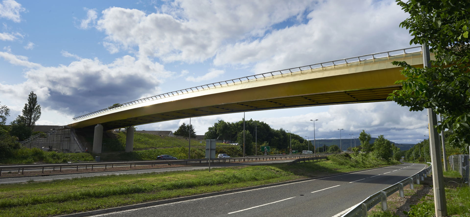 Inverness Campus golden bridge crossing A9 road