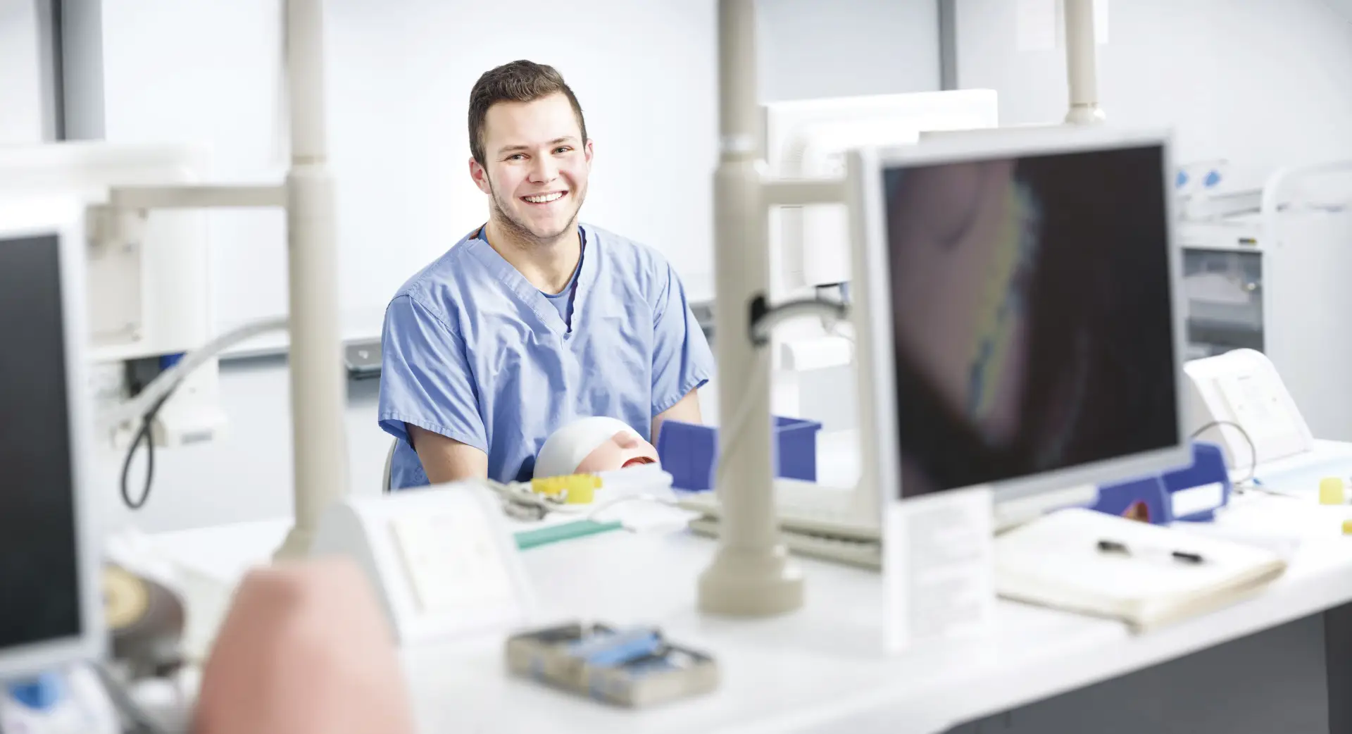 Student  dental assistant learning at Inverness College UHI
